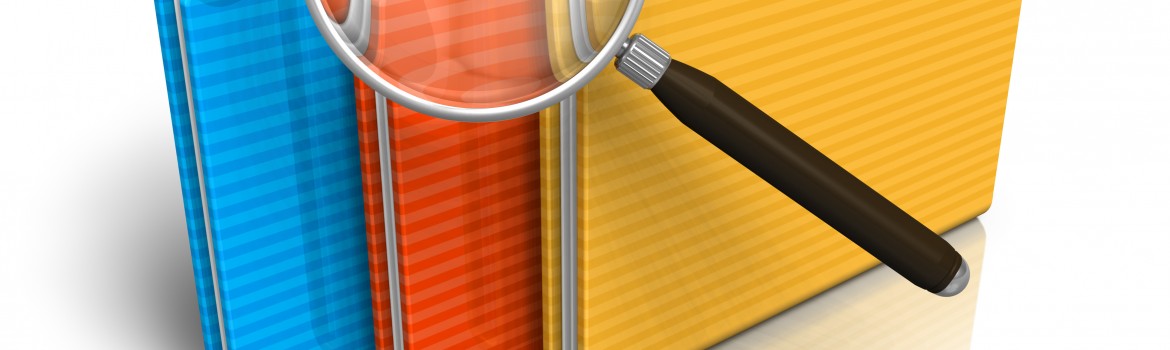 File search concept: folders and magnifying glass